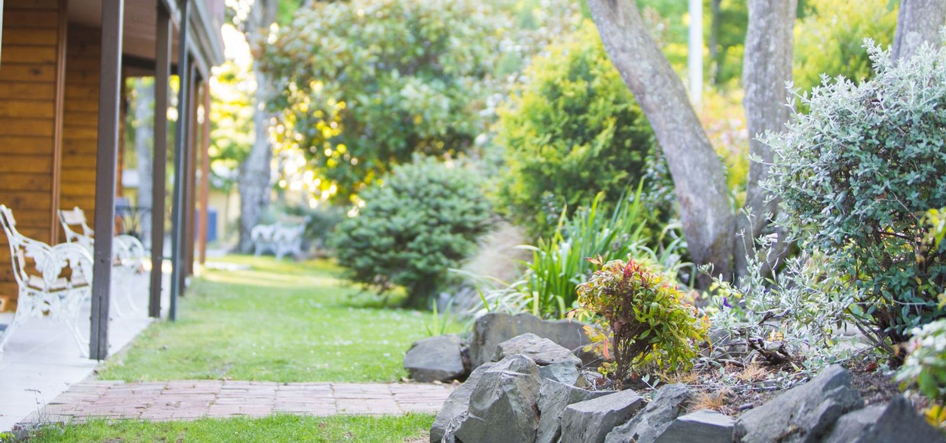 ground floor units with outdoor seating in the backyard